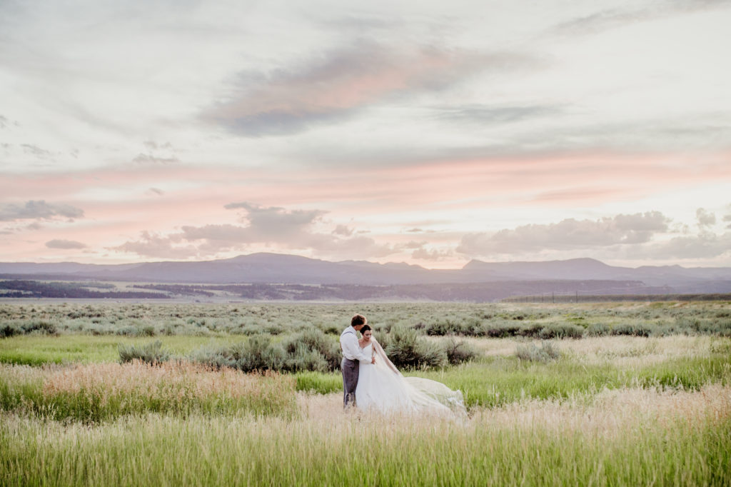 bride and groom in yellowstone national park