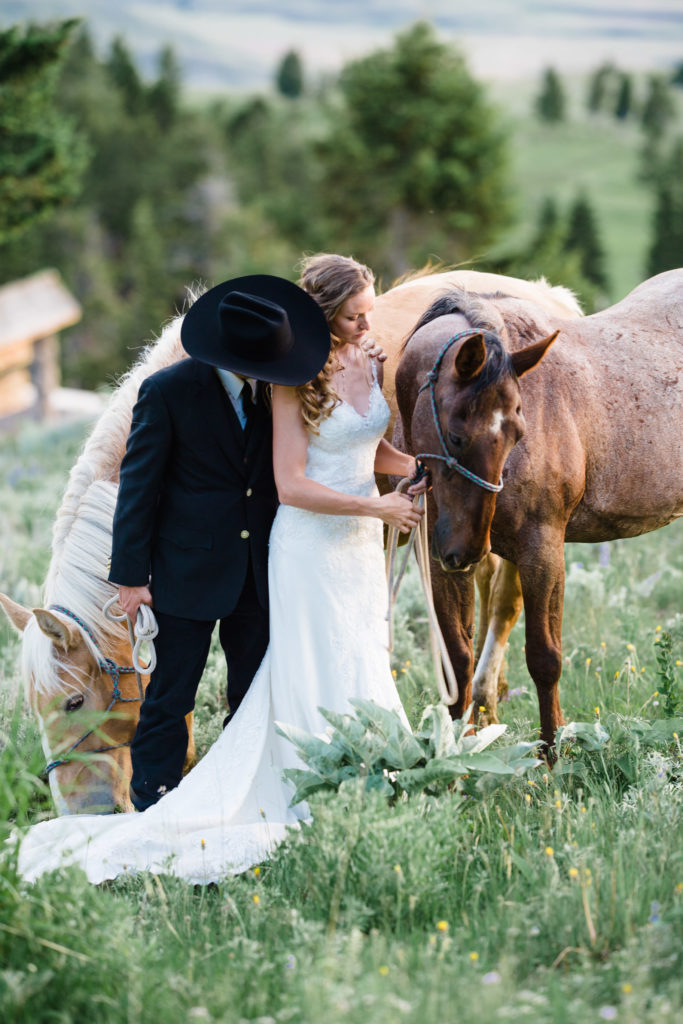 bride and groom horseback riding photos during their Yellowstone National Park Wedding
