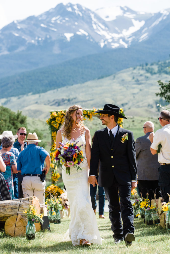 bride and groom just getting married in Yellowstone National Park