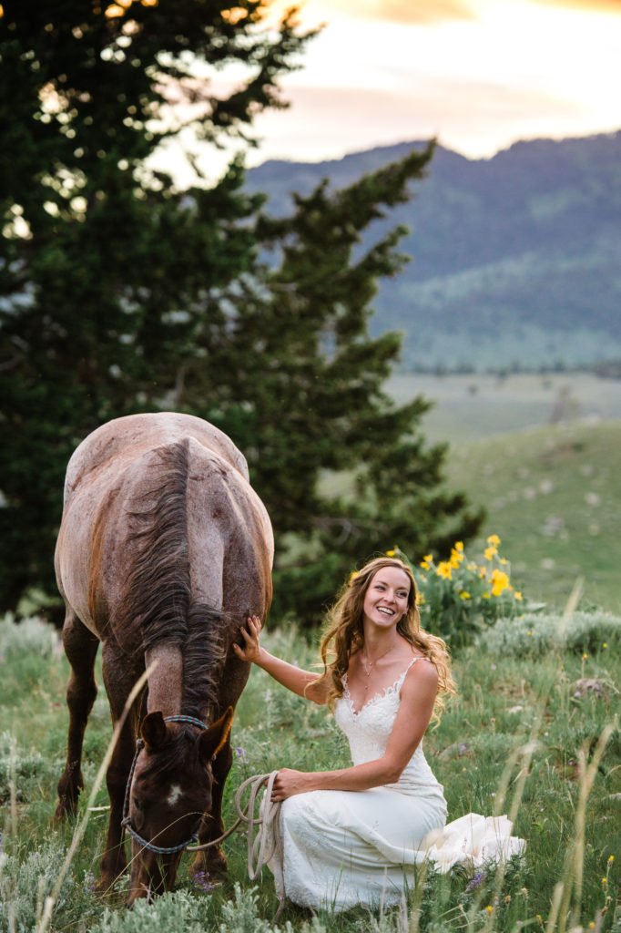 Bride and horse during the sunset session of her Yellowstone National Park Wedding