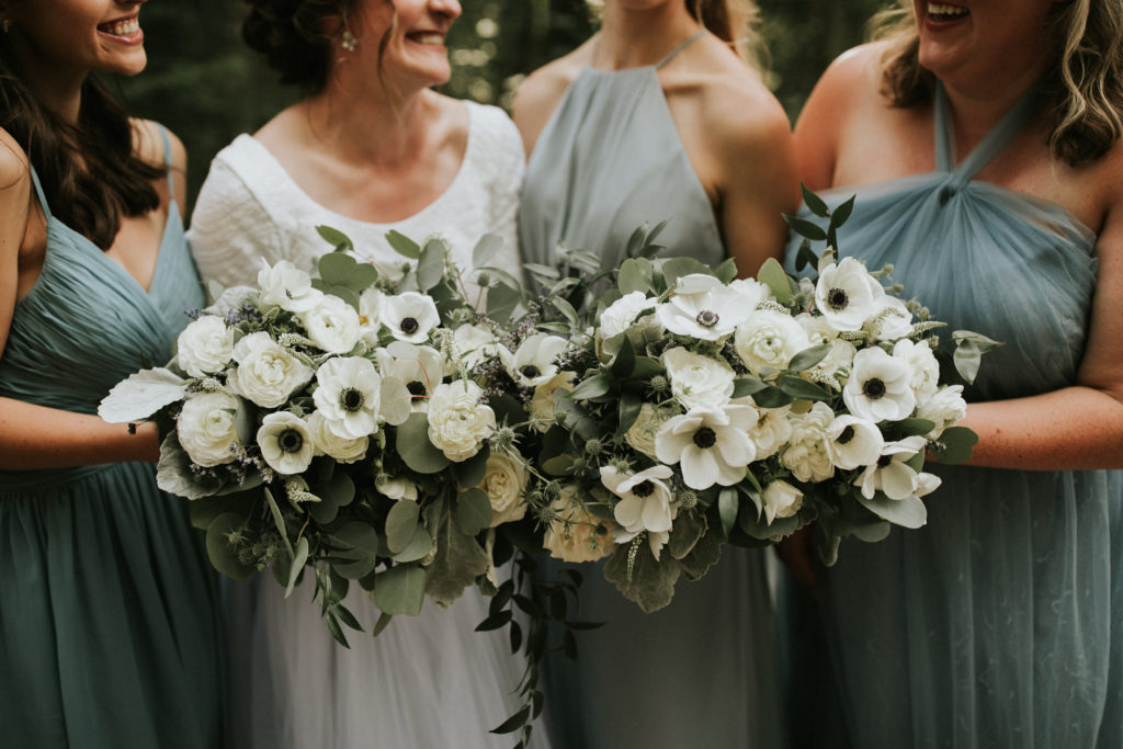 dusty blue wedding bridesmaid dresses with white bouquets