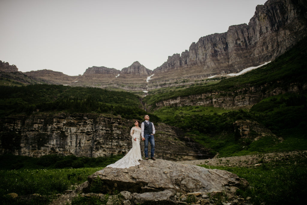 Glacier National Park in Montana is MADE for adventure elopements, and we are made to capture your elopement at the top of those mountains!! If you’re looking to elope in the mountains, we can’t wait to help make your dreams come true. Check out our list of our Top 10 Mountain Elopement Locations Worldwide (must-see hikes included!).