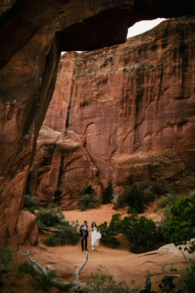 Arches National park elopement, pine tree arch ceremony