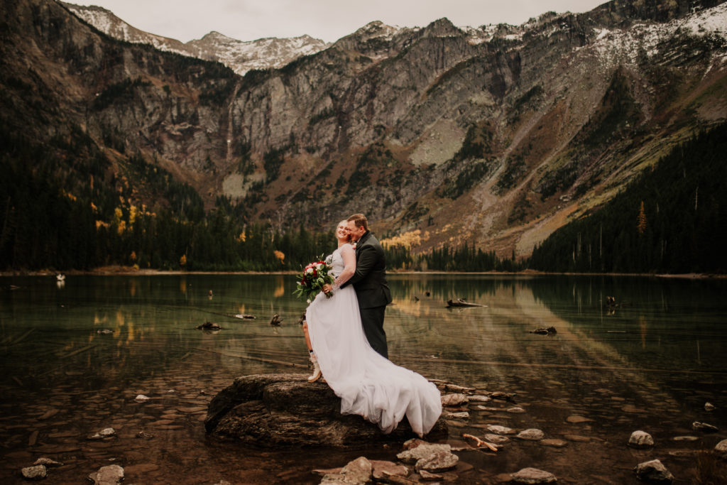 Glacier National Park in Montana is MADE for adventure elopements, and we are made to capture your elopement at the top of those mountains!! If you’re looking to elope in the mountains, we can’t wait to help make your dreams come true. Check out our list of our Top 10 Mountain Elopement Locations Worldwide (must-see hikes included!).  Glacier national Park hiking elopement