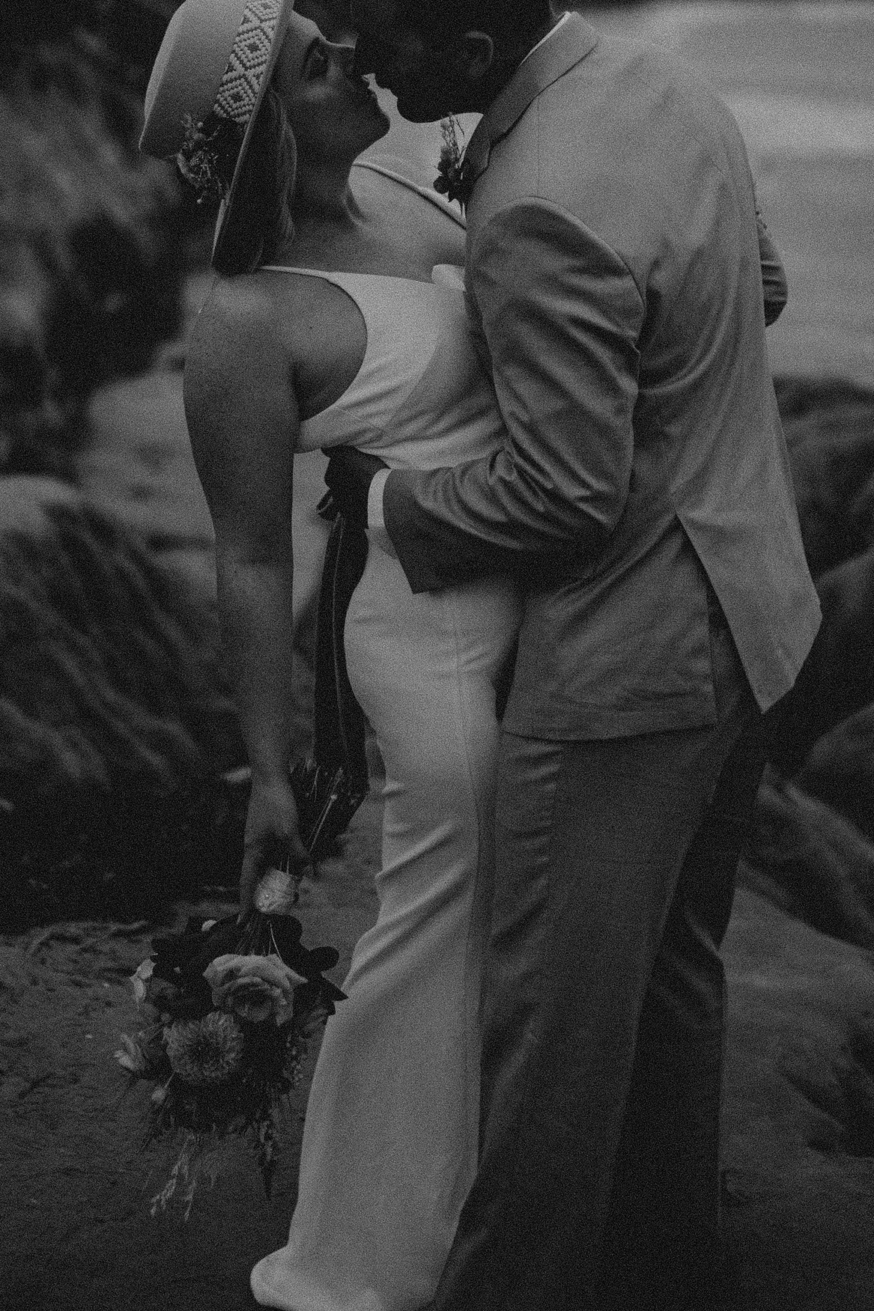 Moody Carlsbad Cliffs Adventure Session. The little beach town of Carlsbad is exploding with boutique shops, great beach life, and lots of tasty restaurants. It's one of our very favorite west coast elopement spots and you'll see why with this moody Carlsbad Cliffs adventure session!