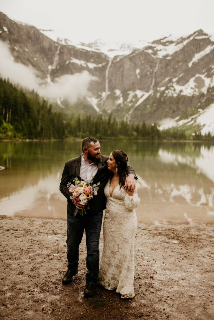 Glacier elopement with hike to avalanche lake. With a ceremony at Lake McDonald, a spring elopement in Glacier National Park was the perfect Montana wedding plan.