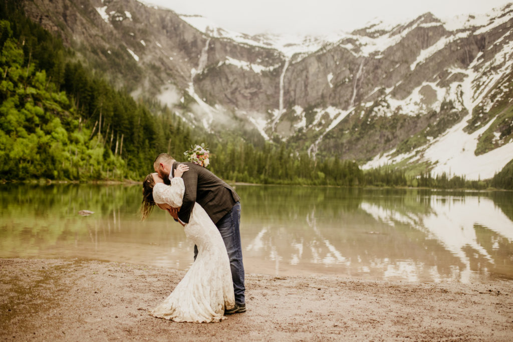 Glacier elopement with hike to avalanche lake. With a ceremony at Lake McDonald, a spring elopement in Glacier National Park was the perfect Montana wedding plan. 