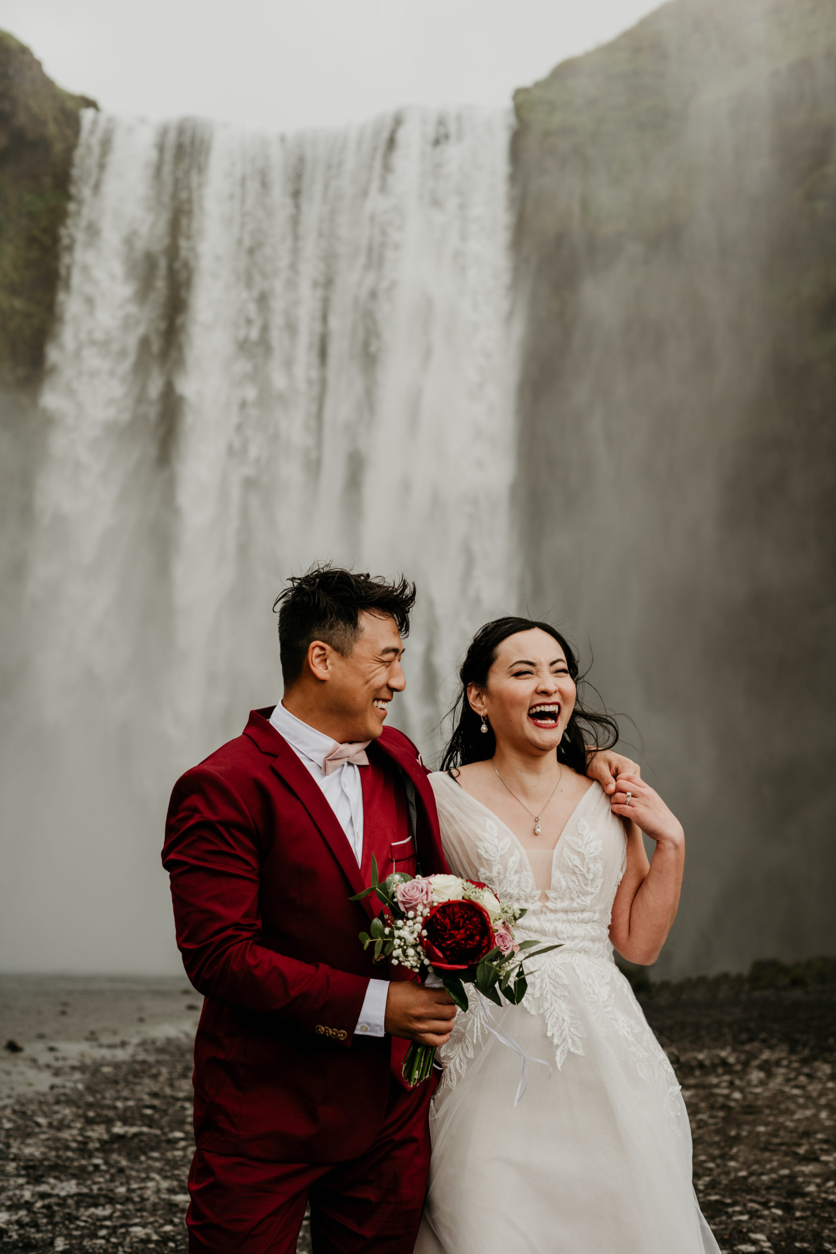 During their Iceland elopement at Reynisfjara, a bride and groom explored Skogafoss and seljalandsfoss. Iceland is a one of a kind and adventurous elopement location and MUST be explored! If you're wondering how to elope in Iceland, see how these two did it! 