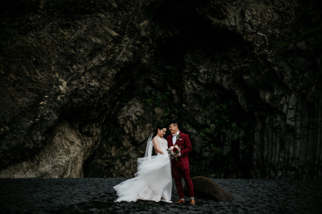 Have a helicopter elopement, couple on wedding day in a cave to share vows.