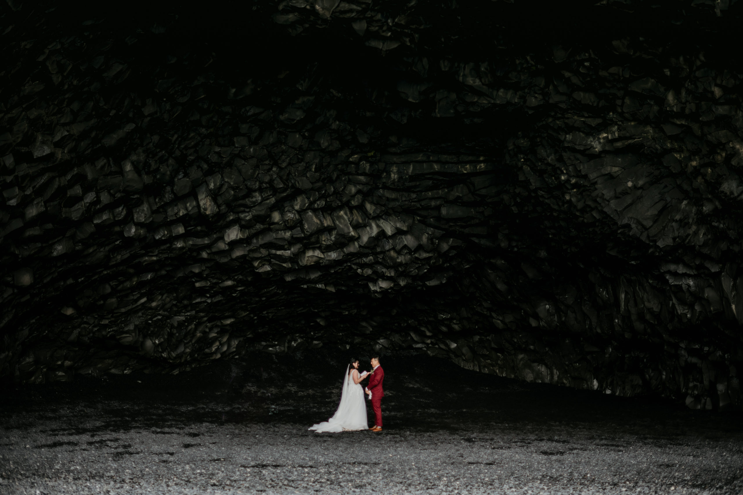 Iceland elopement at Reynisfjara! Iceland is a one of a kind and adventurous elopement location and MUST be explored! If you're wondering how to elope in Iceland, see how these two did it! 