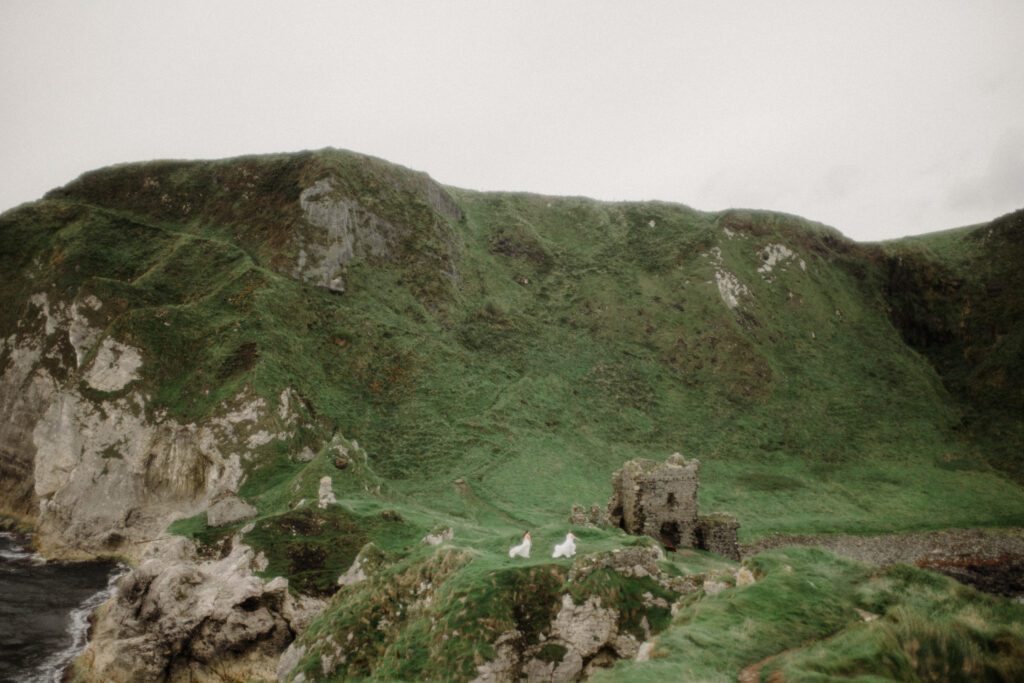 Where to elope in Northern Ireland. Two brides get married at Kinbane Castle in Northern Ireland