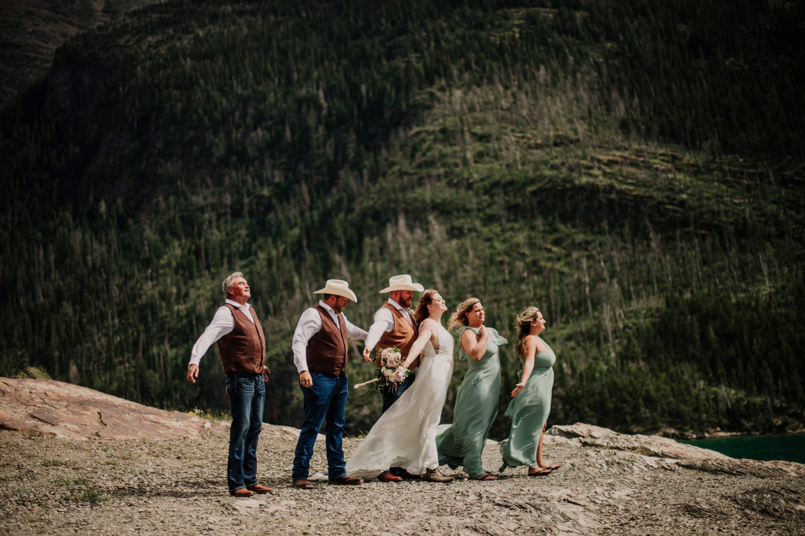 Glacier park elopement at Logan Pass. Bride and groom getting married on Sun Point. Going to the sun road. Where to get married in Glacier National Park. 