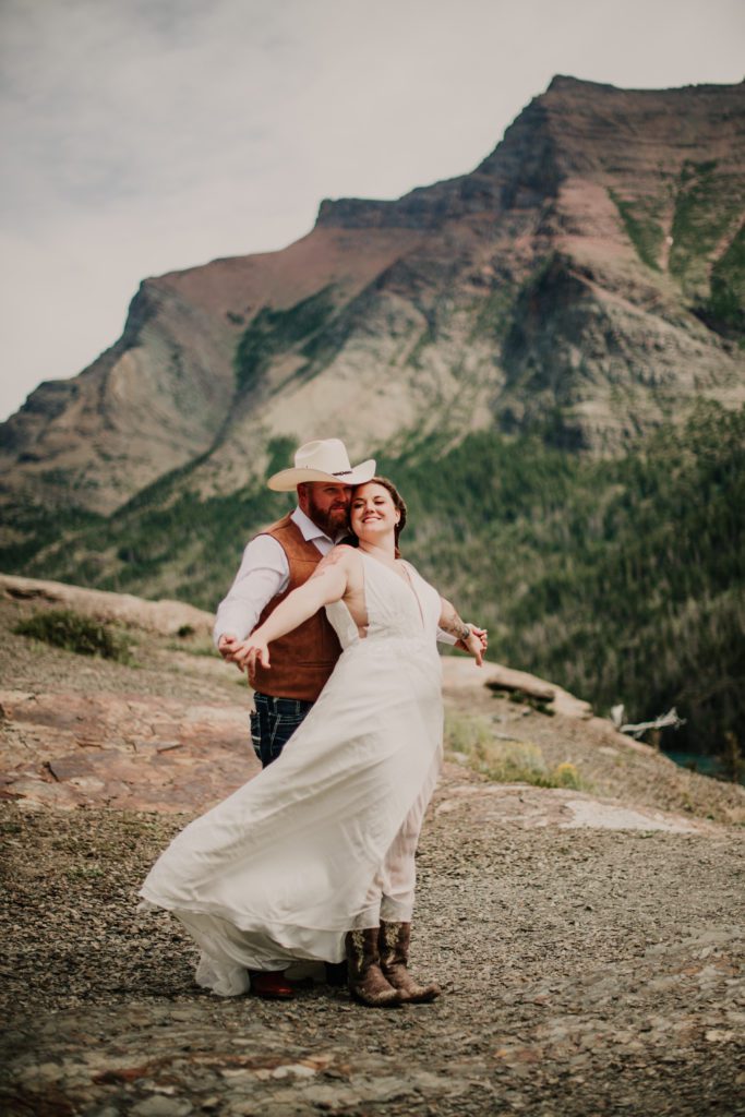 Glacier park elopement at Logan Pass. Bride and groom getting married on Sun Point. Going to the sun road. Where to get married in Glacier National Park. 