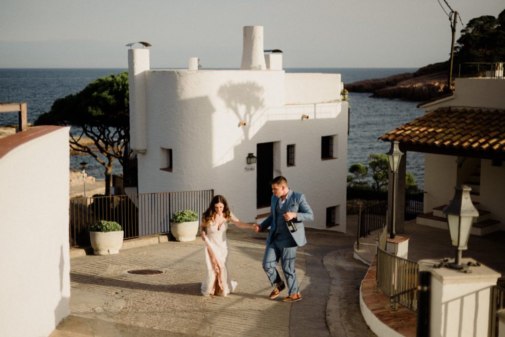 Elope in Barcelona and Costa Brava Spain for all the Love Island vibes, warm mornings, and cystal blue waters. We help our couples know where to stay in Barcelona, the best elopement spots in Costa Brava, and so much more! 