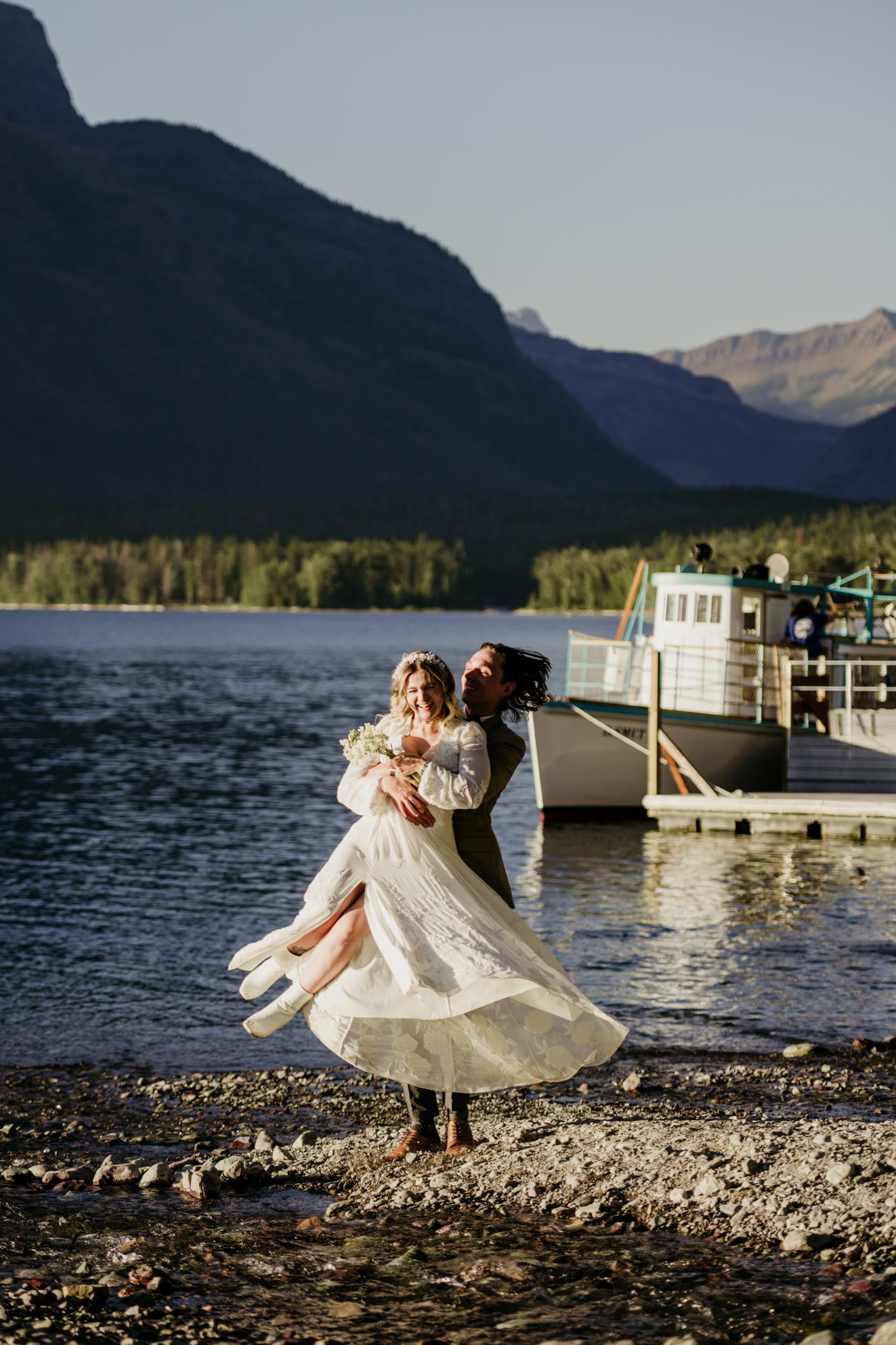 Glacier National Park micro wedding. Wedding photos on Lake McDonald. The best place for photos in Glacier National Park. McDonald Lodge ferry.