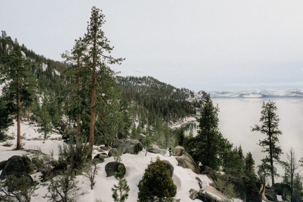 Have an eco friendly elopement by following these tips for conscious tourism.

Lake Tahoe drone photo from a winter elopement hike to Monkey Rock.