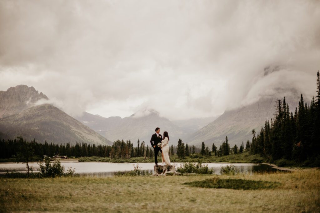 4 ways that this Texas couple came to Montana and did their elopement THEIR OWN WAY! Fall, moody Glacier elopement at Two Medicine! Best wedding ceremony locations in Glacier National park. 
