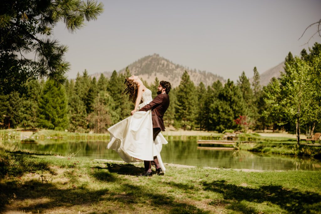 Emerald greens + burgundy details dress up the Montana mountains. Alpine Falls Ranch wedding checks all the boxes for a destination wedding.
