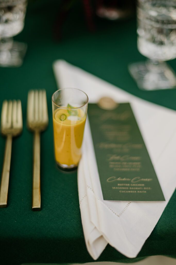 curry soup for wedding appetizer. Emerald green wedding details. Emerald greens + burgundy details dress up the Montana mountains. Alpine Falls Ranch wedding checks all the boxes for a destination wedding.