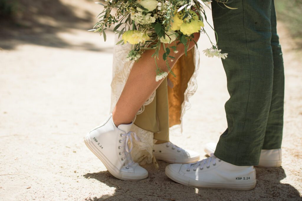 We keep having kickass elopements in epic pockets of the lake such as this adventure elopement in Lake Tahoe at Monkey Rock.

Hiking elopement in Lake Tahoe finished with a sunset boat cruise on the lake! 

Customized converse shoes for wedding shoes. 