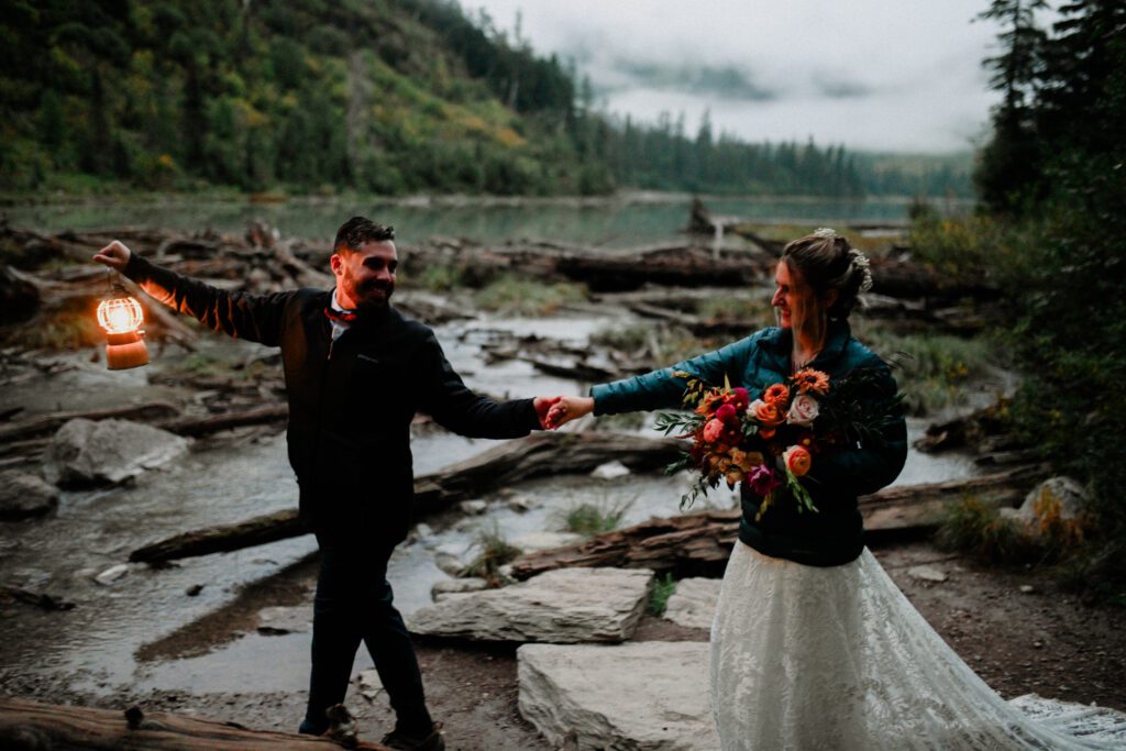 Experience a Glacier National Park adventure elopement with a sunrise hike to Avalanche Lake and a magical ceremony at Logan Pass.