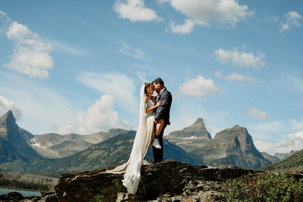 Experience a Glacier National Park adventure elopement with a sunrise hike to Avalanche Lake and a magical ceremony at Logan Pass.