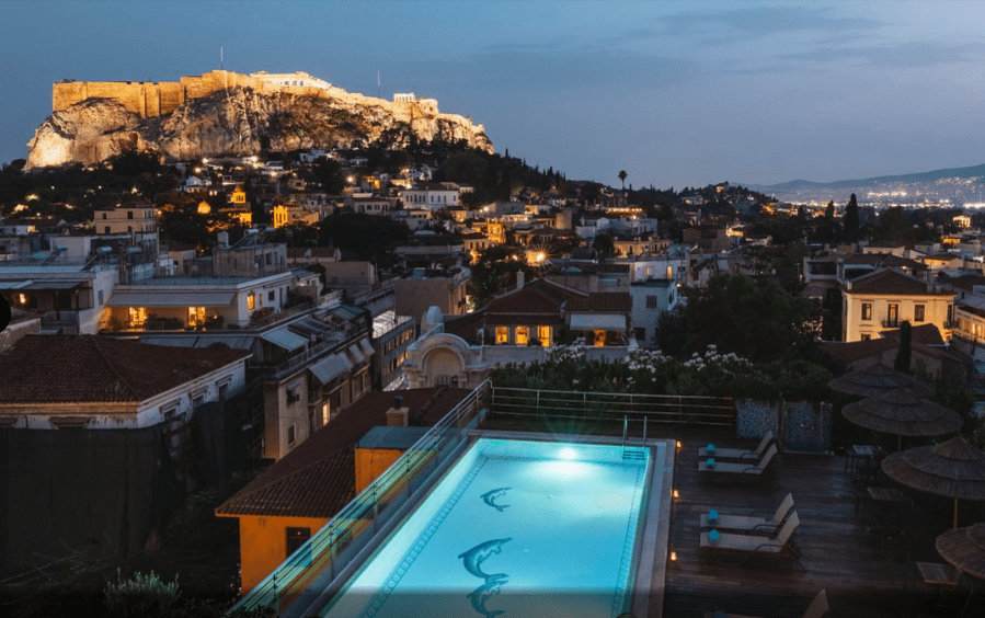 Hotel Electra Palace Athens, view of pool and lit up night sky, elope in Greece.