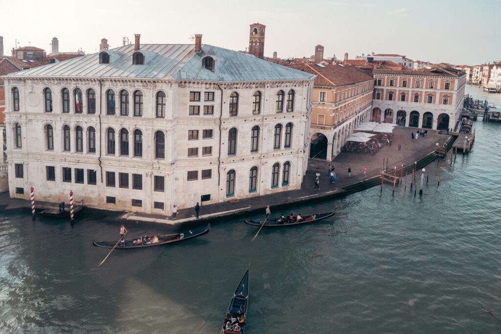 Discover 16 dreamy and romantic activities for couples in Italy private gondola ride in Venice. Couple on a gondola ride in Venice.