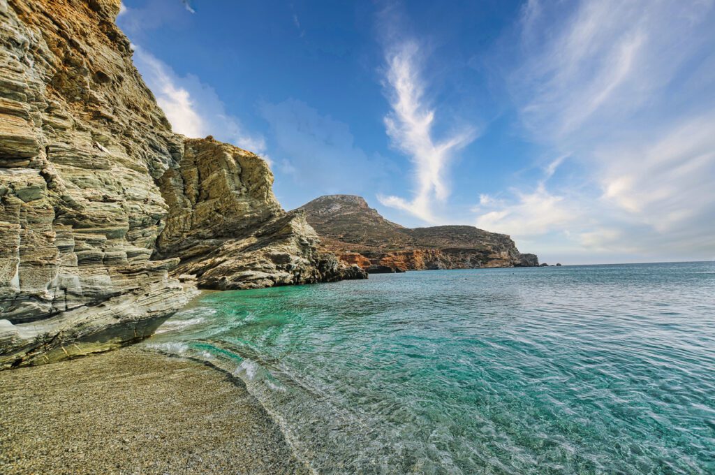 Elope in Greece with current information on Athens, Folegandros, Paros, and Lemnos for 2024 ultimate travel.

Agali Beach beach at the picturesque bay on Folegandros island. Cyclades, Greece