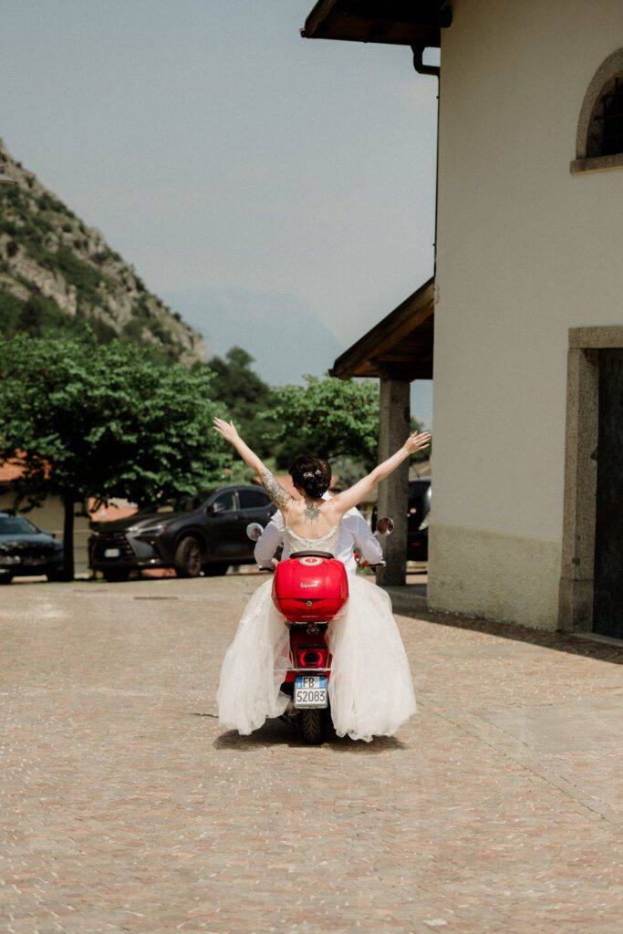 Elopement with red Vespa in Italy.