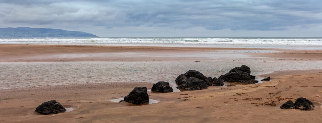 Dunluce Castle elopement, explore Downhill Strand Beach.