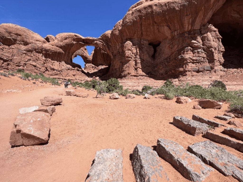 Photos and descriptions of the BEST CEREMONY LOCATIONS and How to Elope in Arches National Park. Double Arch ceremony location in Arches National Park.