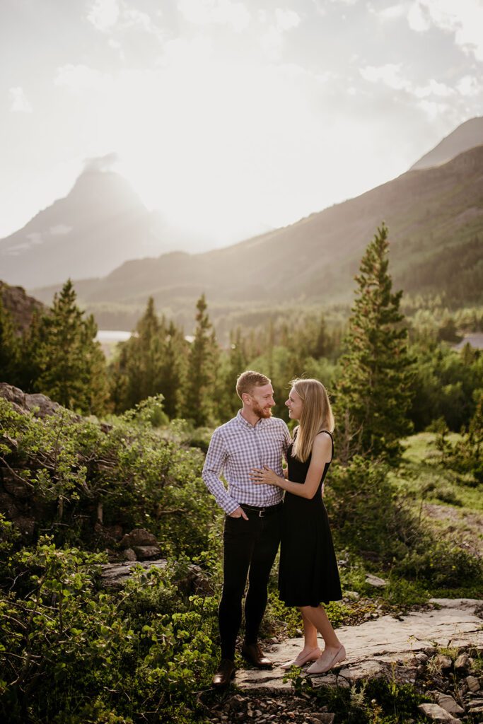 Glacier National Park engagement session in Many Glacier with big mountain views. 