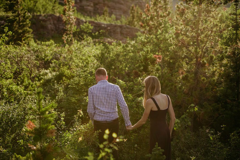 Glacier National Park engagement session in Many Glacier with big mountain views. 