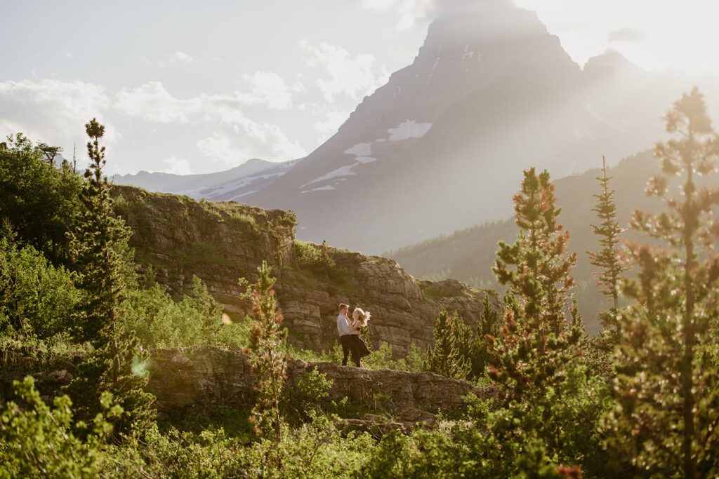 Glacier National Park engagement session in Many Glacier with big mountain views. 