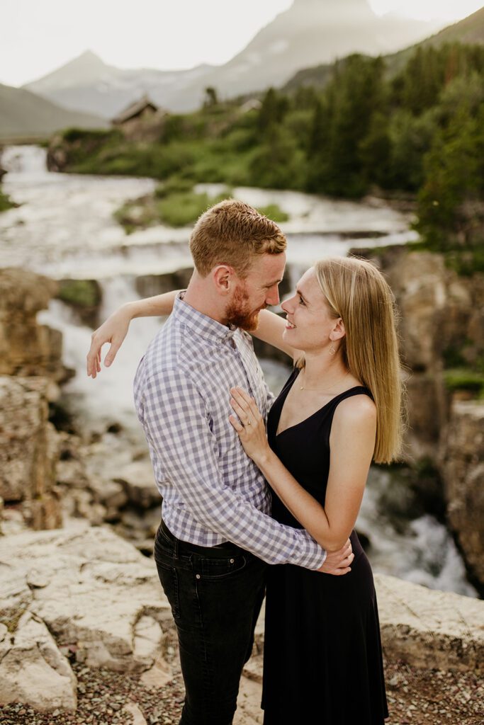 Glacier National Park engagement session in Many Glacier with big mountain views. 