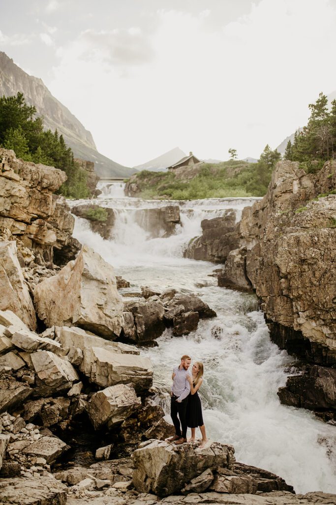 Glacier National Park engagement session in Many Glacier with big mountain views. 