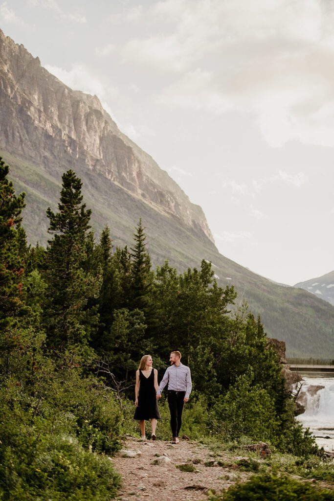 Glacier National Park engagement session in Many Glacier with big mountain views. 