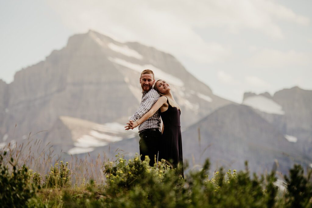 Glacier National Park engagement session in Many Glacier with big mountain views. 