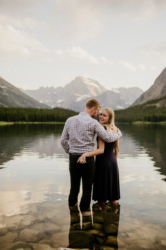 Glacier National Park engagement session in Many Glacier with big mountain views. 