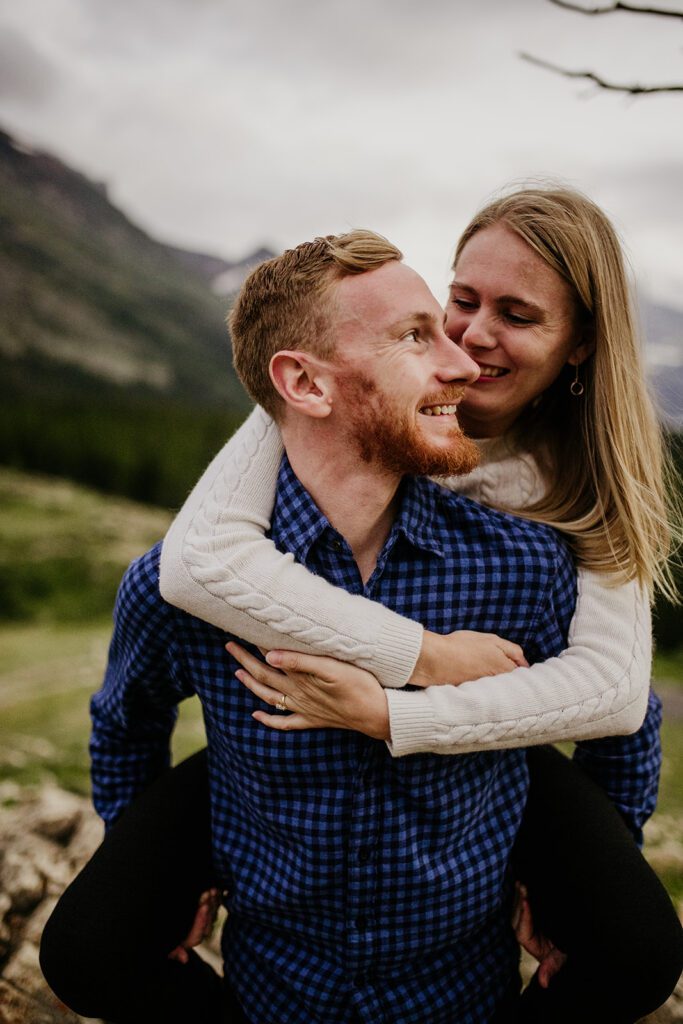 Glacier National Park engagement session in Many Glacier with big mountain views. 