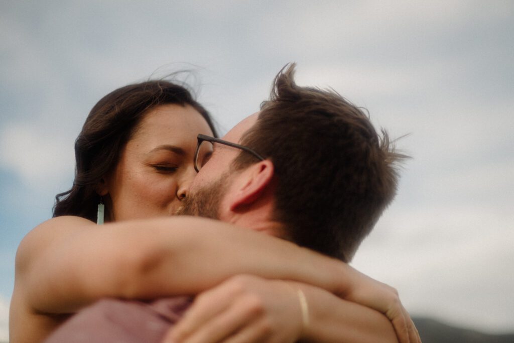 engagement session in Bozeman with mountain views, aspen trees, and candid engagement session photos