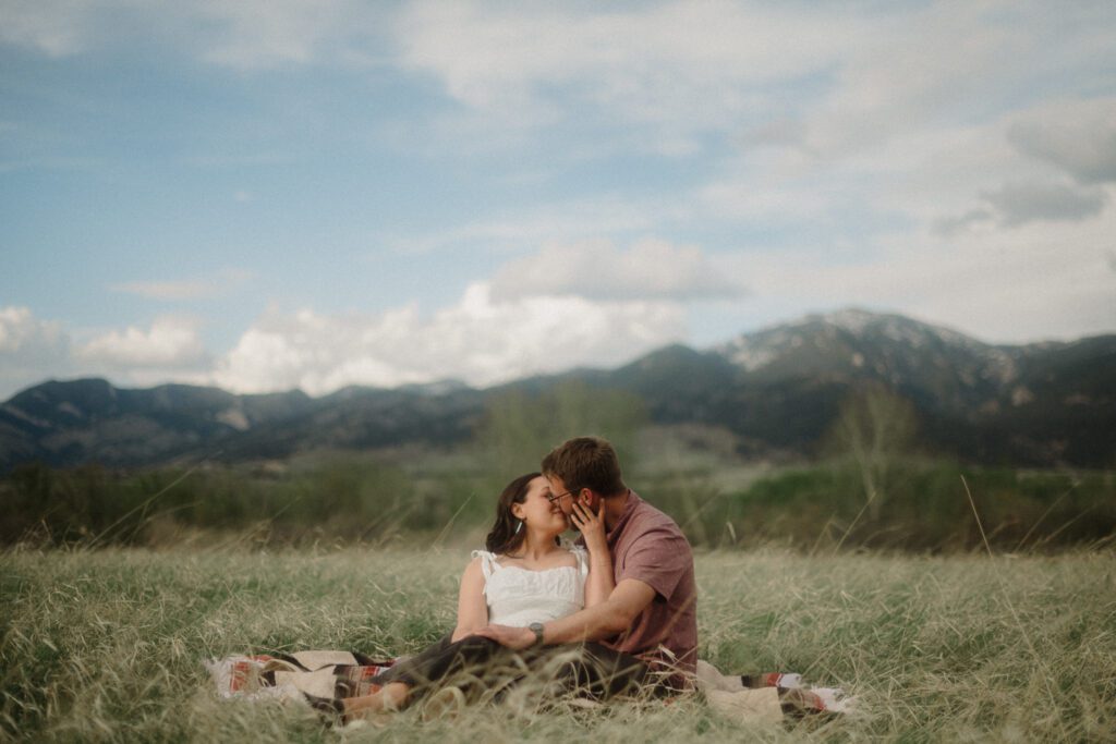 engagement session in Bozeman with mountain views, aspen trees, and candid engagement session photos