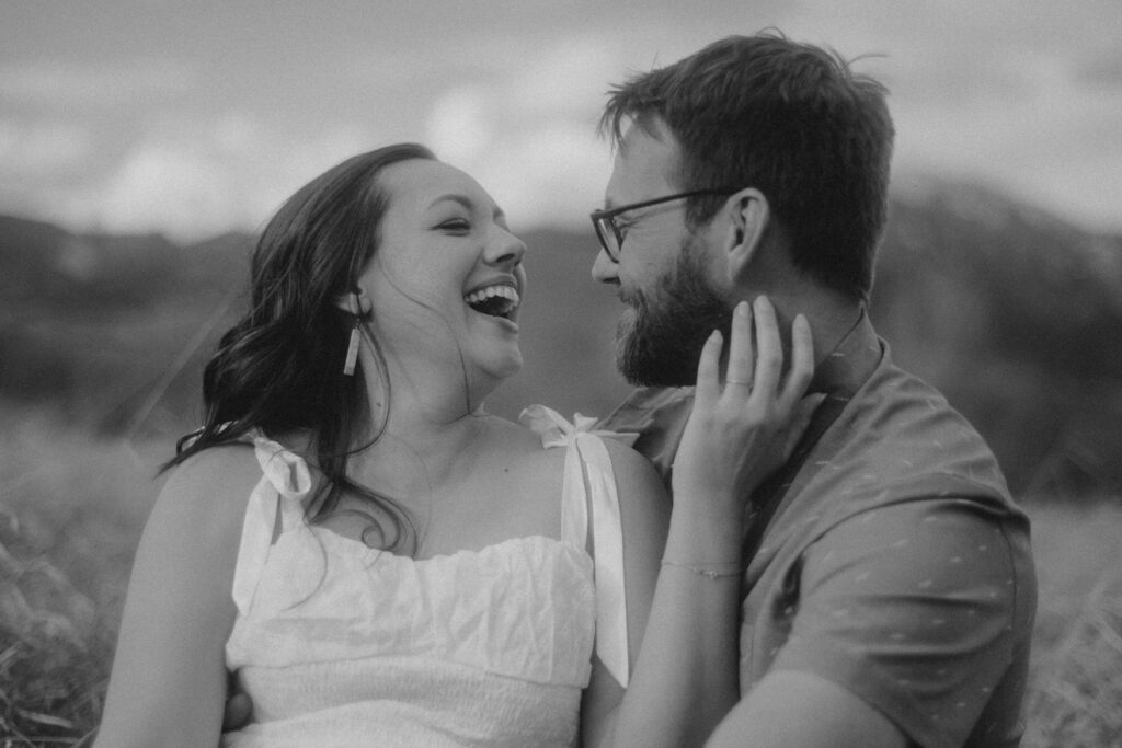 engagement session in Bozeman with mountain views, aspen trees, and candid engagement session photos