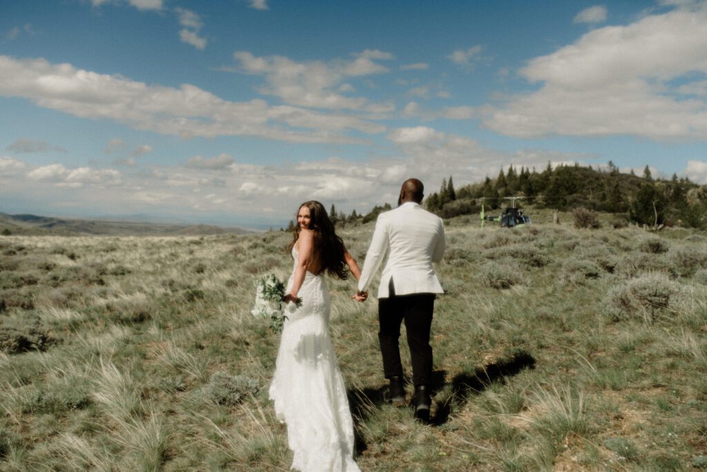 The ultimate helicopter wedding in Montana! From a stretch limo to stunning mountain views, this Bozeman adventure is a dream come true.