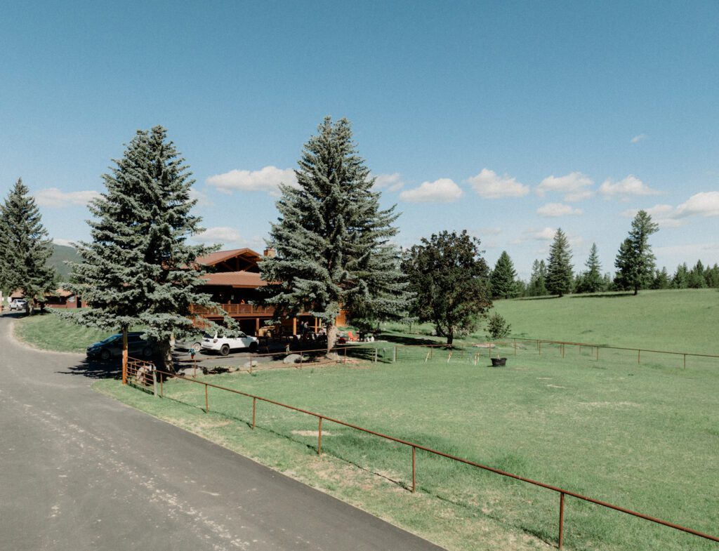 This sweet Glacier Homestead wedding features stunning Glacier National Park views, intimate moments, and heartfelt family celebrations.