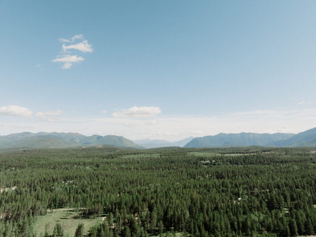 This sweet Glacier Homestead wedding features stunning Glacier National Park views, intimate moments, and heartfelt family celebrations. National park wedding.