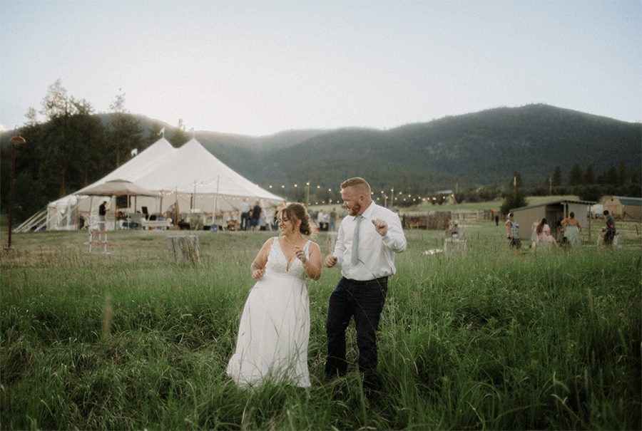 A stunning Little Smith Creek Ranch wedding in the Bitterroot Valley with breathtaking views, heartfelt moments, and a charming rustic theme. Gif of bride and groom dancing.