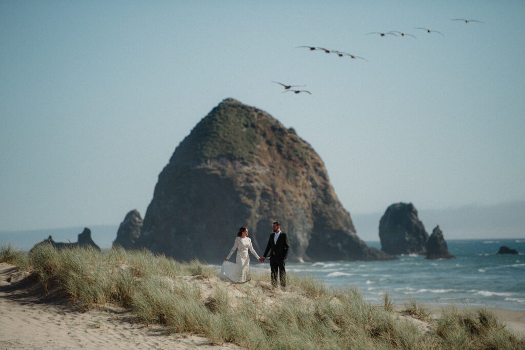 When you think, "elopement Oregon Coast," this is what you think of! Intimate vows at Hug Point, epic Haystack Rock views, and star photos!
