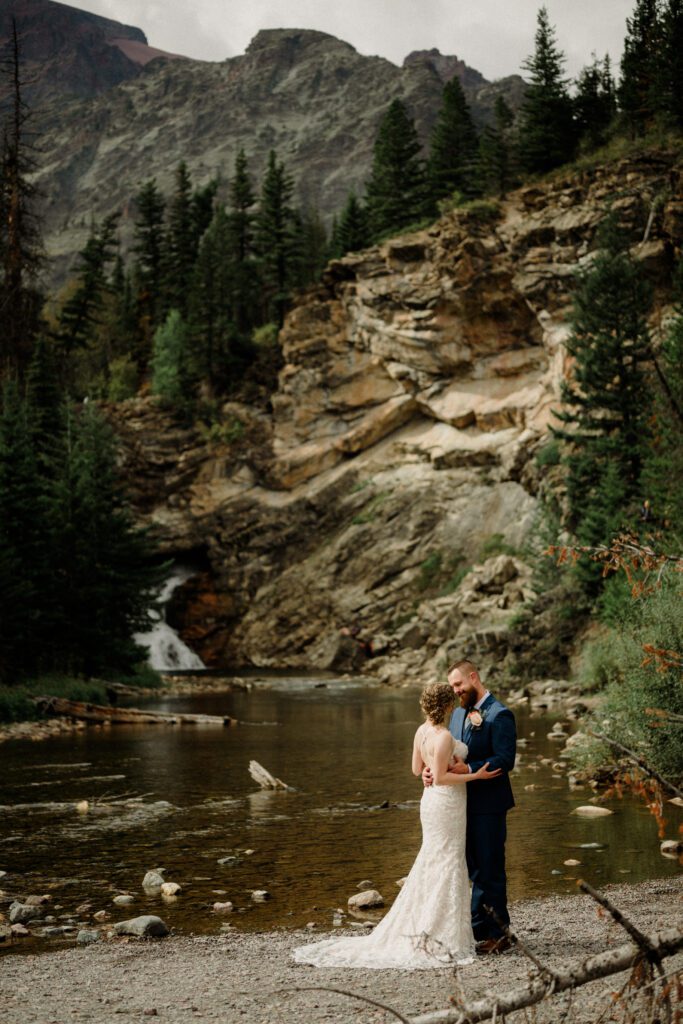 You know it's an adventure wedding in Glacier National Park when you see bears, stumble across mountain sheep and get married! The bride said this about her wedding day, "we literally did EVERYTHING!" 

A Two Medicine wedding ceremony and then a drive up the Going to the Sun Road made this day an epic adventure!